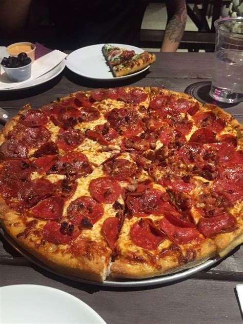 Red rock pizza - All pizzas are hand-tossed with dough made in-house, signature pizza sauce, and 100% Mozzarella cheese. Hot Honey Pepperoni Pizza. MINI 8" 4 Slices $11.50 SMALL 10" 6 Slices $16.25 MEDIUM 12" 8 Slices $23.25 LARGE 14" 10 Slices $26.75 X-LARGE 16" 12 Slices $29.99. Prices and description. Hot Honey Bottle. $5.00. Prices and description